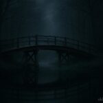 A wooden bridge at night over a calm stream in a silent forest